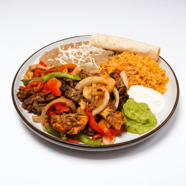 Carnitas plate with rice, beans and guacamole