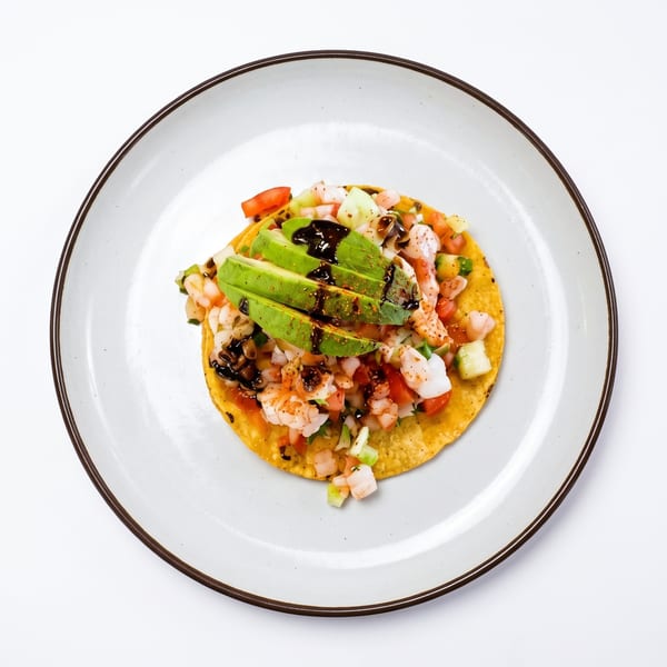 Enchiladas with red sauce, rice and beans