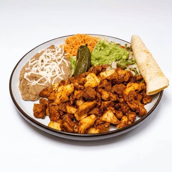Fajitas plate with peppers, onions, rice and beans